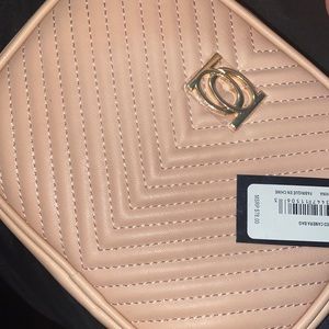 Cream color crossbody Bebe bag